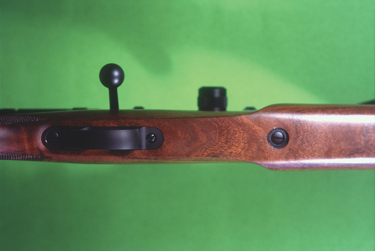 The bottom of the Cooper’s stock shows fine wood-to-metal fit.